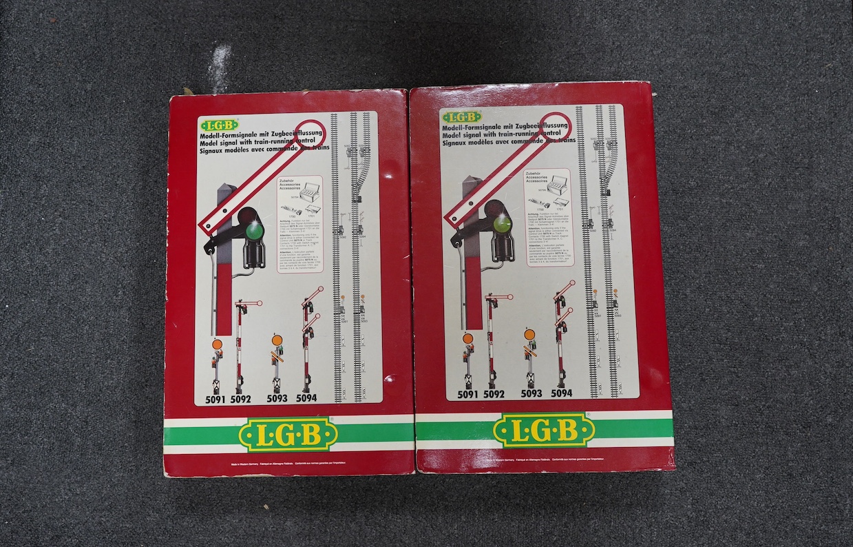 A collection of boxed Lehmann LGB and Piko G scale items including; a Piko Bahnhof Rosenbach Station (62040), a box of curved track sections (1600), a Hauptsignal (5092), Vorsignal (5091), level crossing (5065), driving